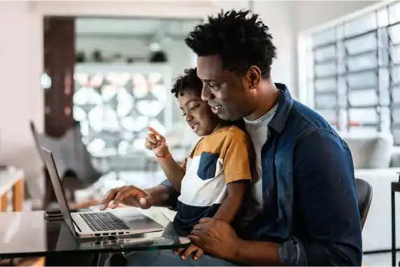 dad with kid on computer