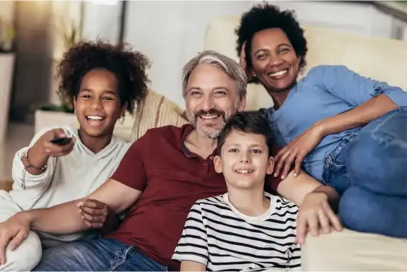 Family laughing at show together